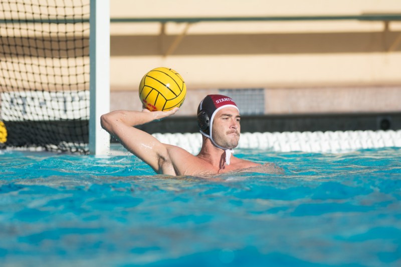 Junior goalkeeper Oliver Lewis prepares to send the ball back out to his team after a save. Lewis' guidance from the goal will be useful in a tough game against Cal this weekend. (RAHIM ULLAH/The Stanford Daily)