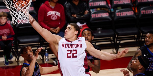 Junior Reid Travis rebounded from a serious upper-leg stress fracture last season to tally 24 points against Harvard in Shanghai. Travis was on the free throw line 19 times and netted 17 rebounds over the Crimson. (HECTOR GARCIA-MOLINA/isiphotos.com)