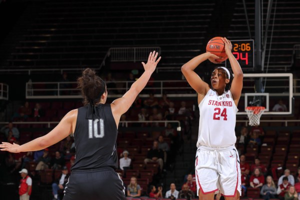 Senior leader Erica "Bird" McCall notched a 27 point performance in addition to yet another double-double en route to Stanford's Cancun Challenge tournament victory. Bird ended the weekend as the Tournament MVP and was accompanied at the awards table by senior Karlie Samuelson who made the all-tournament team. (BOB DREBIN/isiphotos.com)
