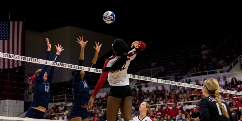 Fifth-year senior middle blocker Inky Ajanaku has been phenomenal at the net this season, averaging 1.51 blocks per set — the eighth-best mark in the nation. However, she also serves as an offensive threat, as her 2.66 kills per set can attest. (NATHAN STAFFA/The Stanford Daily)