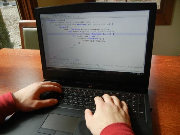 Student coding in Javascript (VEDI CHAUDHRI/The Stanford Daily).