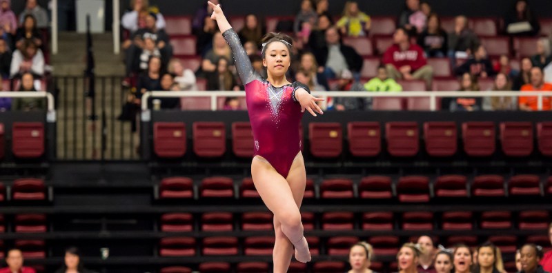 Freshman Ashley Tai tied for first place on beam with a career-high 9.875. The Cardinal gymnast hopes to continue individual success in her first postseason meet next week. (KAREN HICKEY/isiphotos.com)