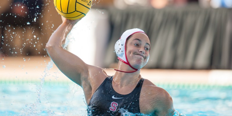 Maggie Steffens '17 of USA women's water polo rising out of the water during her time playing for Stanford