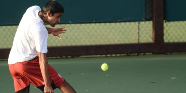 Sophomore Sameer Kumar and his teammate Michael Genender won their doubles match, but Stanford struggled in singles play, falling to No. 11 Cal. (SAM GIRVIN/The Stanford Daily)
