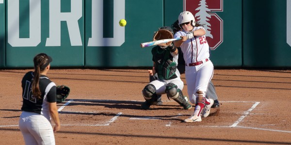 Freshman Teaghan Cowles (above right) was a key player in the Cardinal's victory over Oregon State, scoring two runners with a triple in the top of the eighth inning of Sunday's matchup. She currently leads the team in hits and sacrifices and is second in total bases on the year. (BOB DREBIN/isiphotos.com)