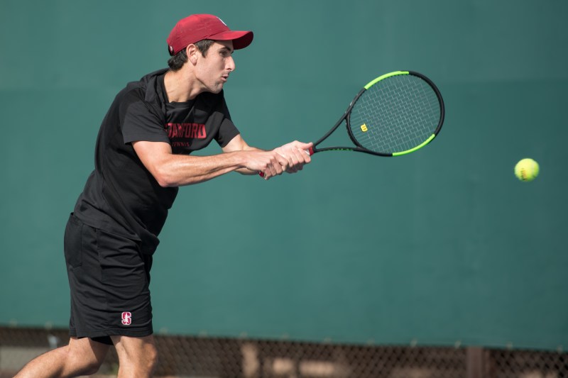 Freshman William Genesen has surprised many by catching fire during the final stretch of the Cardinal men's tennis regular season, owning a six-match winning streak. (LYNDSAY RADNEDGE/isiphotos.com)