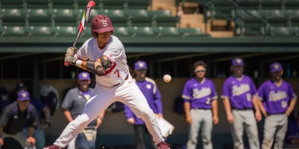 Junior Jesse Kuet played the hero in Stanford's extra-inning win on Sunday, hitting a walk-off single to complete the comeback and the sweep of Washington. This series marks the last home play for the Cardinal seniors and head coach Mark Marquess. (SYLER PERALTA-RAMOS/The Stanford Daily)
