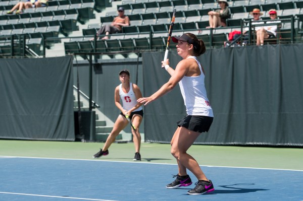 Senior Taylor Davidson (front) and freshman Emily Arbuthnott (back) got it done for the Cardinal against Michigan and UNC this weekend, succeeding in doubles as a pair before winning their respective singles matches in both duals. (KAREN AMBROSE HICKEY/isiphotos.com)