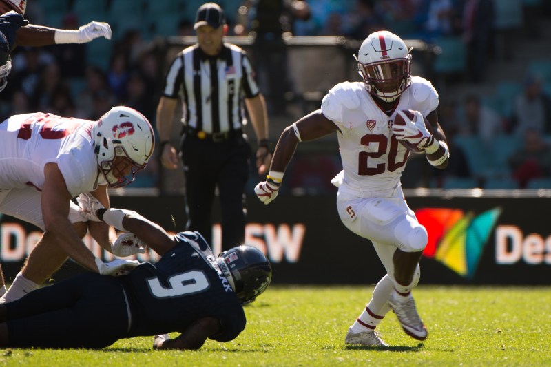 Junior running back Bryce Love (20, above) broke his first carry for 62 yards. He ended the game with 180 rushing yards on 13 carries.(DON FERIA/isiphotos.com)