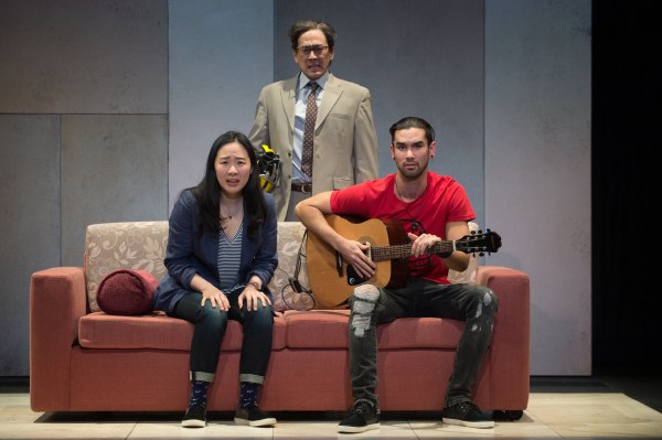 In the Oregon Shakespeare Festival's 2017 production 'Hannah and the Dread Gazebo,' Hannah (Cindy Im), Father (Paul Juhn) and Dang (Sean Jones) learn of North Korean leader Kim Jong-il’s death from South Korean TV news (JENNY GRAHAM/Oregon Shakespeare Festival).
