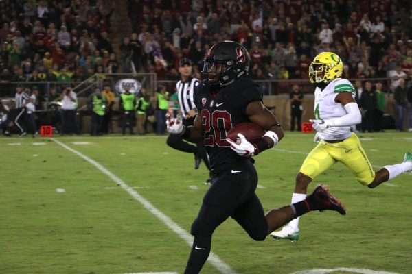 Junior running back Bryce Love (20) had 147 rushing yards on 17 carries and two touchdowns before suffering an injury in the third quarter.(ANTHONY MAYFIELD/The Stanford Daily)
