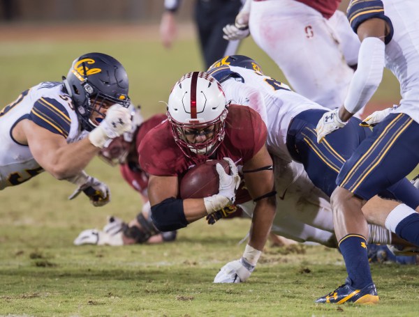 Junior running back Cameron Scarlett (above) finished the game off against Cal in  the 120th Big Game. His runs allowed Stanford to run out over seven minutes of game clock to end the game.(DAVID BERNAL/isiphotos.com)