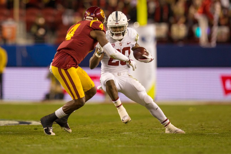 Junior running back Bryce Love (20) played admirably for the Cardinal as his 125 rushing yards on 22 carries was one on a high ankle sprain that has bothered him all year.(SYLER PERALTA-RAMOS/The Stanford d Daily)