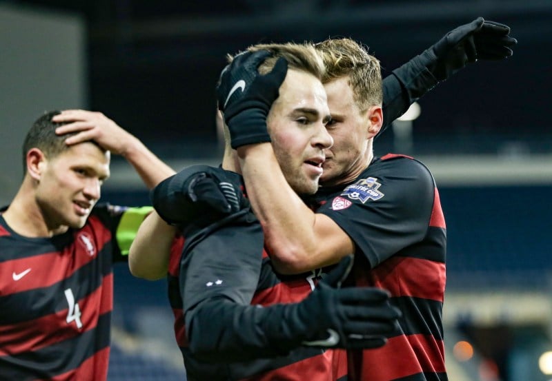 Senior midfielder Sam Werner (center) made the game-winning goal for the Cardinal to give Stanford its third consecutive national title. (TONY QUINN/isiphotos.com)