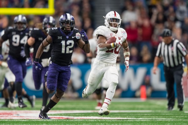 Junior running back Bryce Love (20) dominated the 2017 season. He broke Stanford's single-season and single-game rushing records, broke numerous FBS records, won the Doak Walker award and was the runner-up to the Heisman. All that is coming back in 2018.(JIM SHORIN/isiphotos.com)