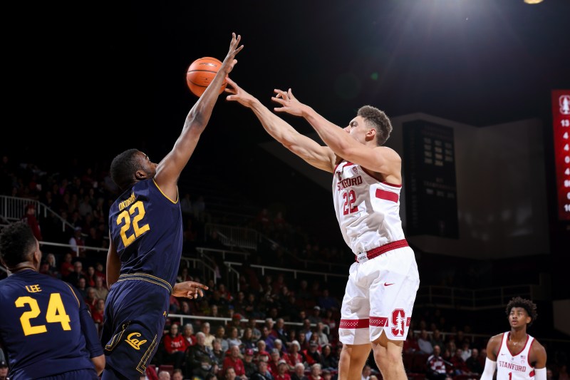 Senior forward Reid Travis (right) was a monster for the Cardinal in the win over Cal in the first round of the tournament.(BOB DREBIN/isiphotos.com)