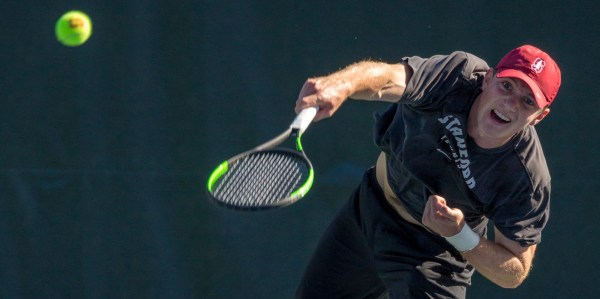 Senior Tom Fawcett (above), currently ranked No. 8 in the nation for singles, won his singles and doubles match in the "Big Slam" versus Cal on Friday, boosting the Cardinal to a 4-0 victory. (SYLER PERALTA-RAMOS/The Stanford Daily)