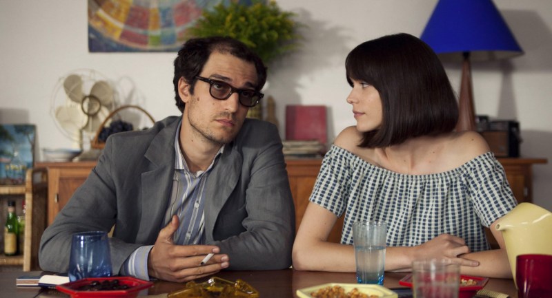 Louis Garrel as the filmmaker and Stacy Martin as his actress-wife, Anne Wiazemsky, in “Godard Mon Amour.” (Courtesy of Cohen Media Group)