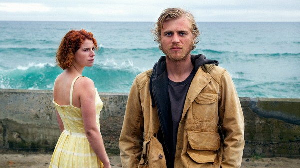 Moll (Jessie Buckley) and Pascal (Johnny Flynn) stand on the coast of Jersey in "Beast." (Courtesy of 30WEST)