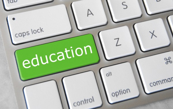 Keyboard with "education" written over the shift key