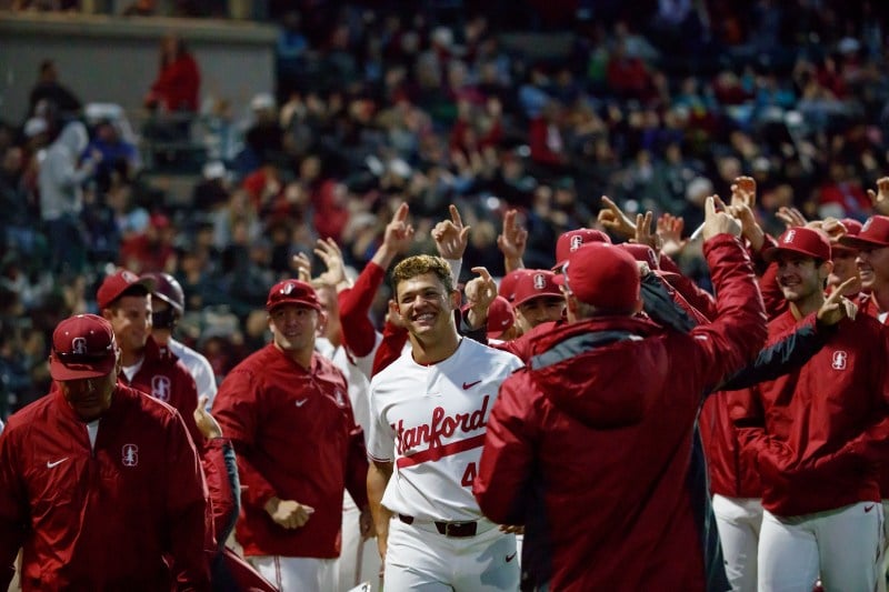 Freshman outfielder Christian Robinson (center) roped a walkoff double down the right field line  in the 13th inning to win the opener for the Cardinal in the NCAA Regional against Wright State.(BOB DREBIN/isiphotos.com)