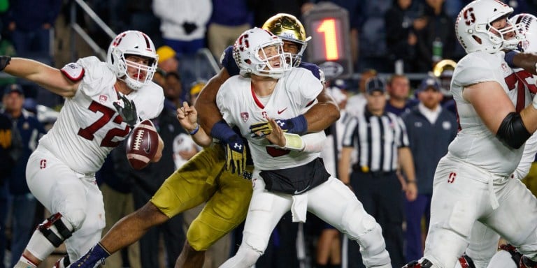 Junior quarterback KJ Costello (#3 above) was sacked five times in No. 7 Stanford's 17-38 loss to No. 8 Notre Dame. The Cardinal offensive line will need to step up against Utah for Costello to have success in the pocket. (BOB DREBIN/isiphotos.com)