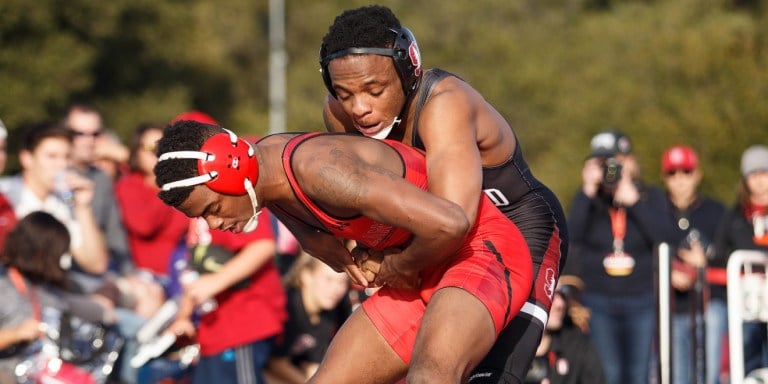 Junior Gabriel Townsell wrestles during his match against SF State on Saturday. Townsell won to help kickstart the Cardinal to an easy team victory.