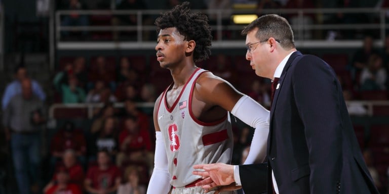 Head coach Jerod Haase talks to sophomore point guard Daejon Davis during a game last season. Davis, a talented floor general, is expected to take on a bigger role this season for an upstart Cardinal team.