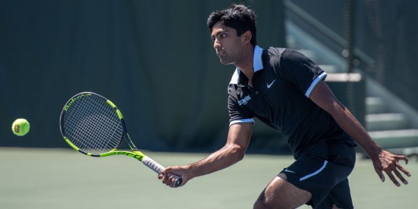 Senior team captain Sameer Kumar hits a forehand volley during the ITA Kick-Off Weekend. Kumar snatched tiebreak victories in singles and doubles on Saturday. (LYNDSAY RADNEDGE/isiphotos.com)