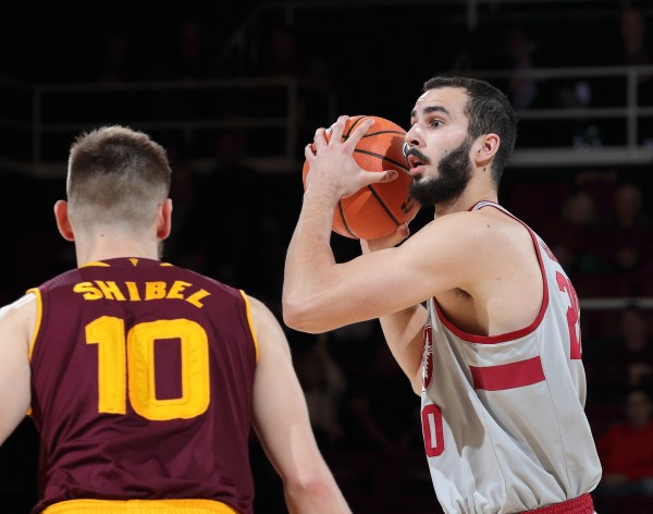 Senior forward Josh Sharma (above) continues impressive play, putting up 17 points and 7 assists, but Cardinal ultimately fall to Arizona State (BOB DREBIN/isiphotos.com)