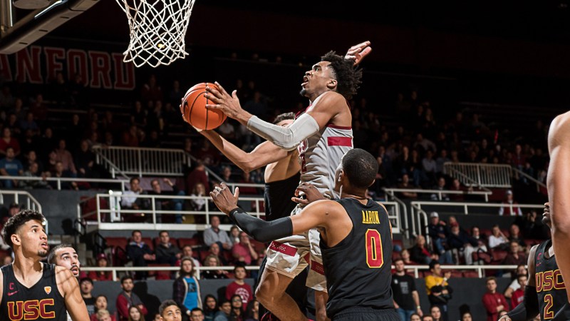 Freshman guard Bryce Wills (above) finishes through contact to put in the game-winning basket for Stanford. Wills finished with 11 points and 6 rebounds as the Cardinal down the Trojans. (KAREN AMBROSE-HICKEY/isiphotos.com)