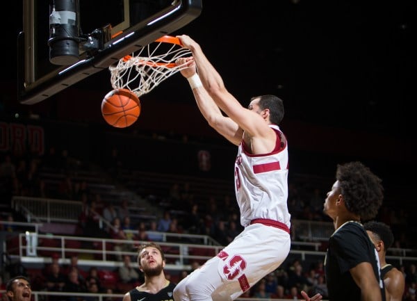 Senior center Josh Sharma (above) hit 10-11 of his shots on Saturday night, recording a team high 22 points and 12 rebounds in the Cardinal's 104-80 win. (ERIN CHANG/isiphotos.com)