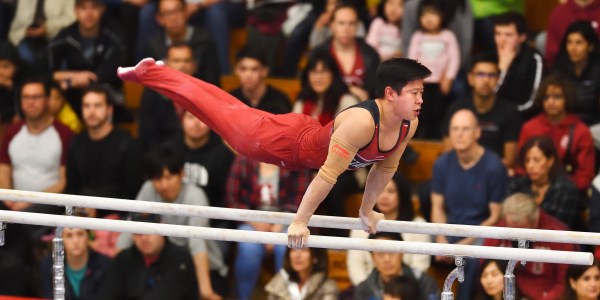 Sophomore Blake Sun (above) had himself a night on Friday, recording the nation's second-best score in the parallel bars. Sun's 14.950 points marks his season best and helped the Cardinal claim a victory. (HECTOR GARCIA-MOLINA/isiphotos.com)