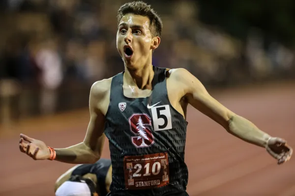 Sophomore Connor Lane (above) celebrates after breaking his 5,000-meter personal record by 17 seconds on Thursday night at the Payton Jordan Invitational. Lane's time of 13:42.31 placed him fifth in the field. Junior Alex Ostberg finished seventh in the race, with a 17-second lifetime best of own (13:42.44). (SPENCER ALLEN/SportsImageWire.com)