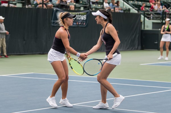 The duo of seniors Caroline Lampl (left) and Kimberly Yee (right) are Stanford's top-ranked doubles squad, sitting at No. 19 nationally. Recently named to the All-Pac-12 First Team, Lampl has won each of her last 21 consecutive matches in dual match play, a streak that leads the team. (KAREN AMBROSE HICKEY/isiphotos.com)
