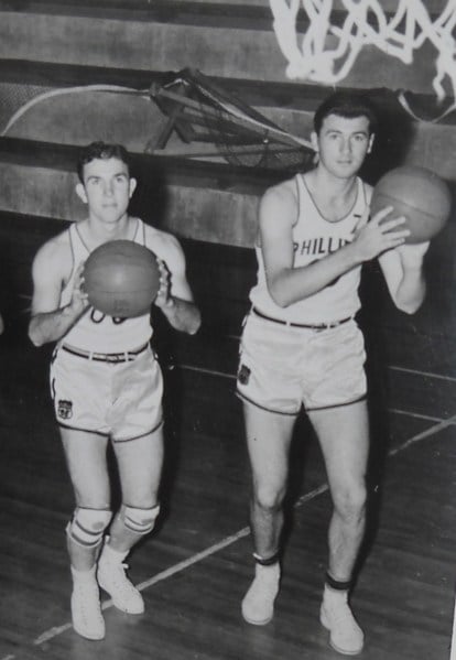 Hank Luisetti (right) is a three-time All-American basketball player who played at Stanford in the 1930s. He revolutionized the game with his one-handed shot and was later inducted into the Basketball Hall of Fame in 1959. (Courtesy of Wikimedia Commons)