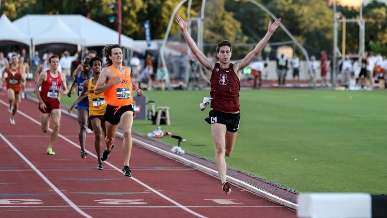 Fifth-year senior Steven Fahy (above) celebrates as he wins the men's 3,000 meter steeplechase. Despite falling over the final barrier, the All-American outlasted the field by 0.6 seconds to claim his first NCAA title. (SPENCER ALLEN/SportsImageWire.com)