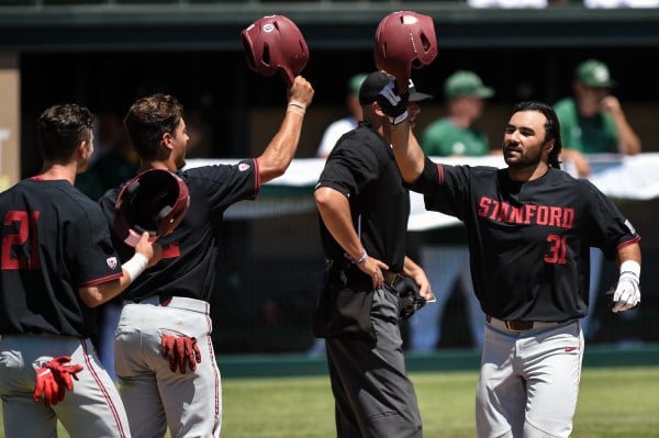 The Cardinal routed Sacramento State 12-3 in a must-win regional playoff game. Nick Bellafronto (above, 31) crushed a three-run homer to center, which kept the game out of reach for the Hornets. (Courtesy of Stanford Athletics)