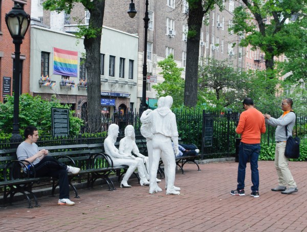 George Segal's sculptures, entitled "Gay Liberation," welcome modern-day visitors to Sheridan Square. A second casting of this work can be found at Stanford. (InSapphoWeTrust / Wikimedia)