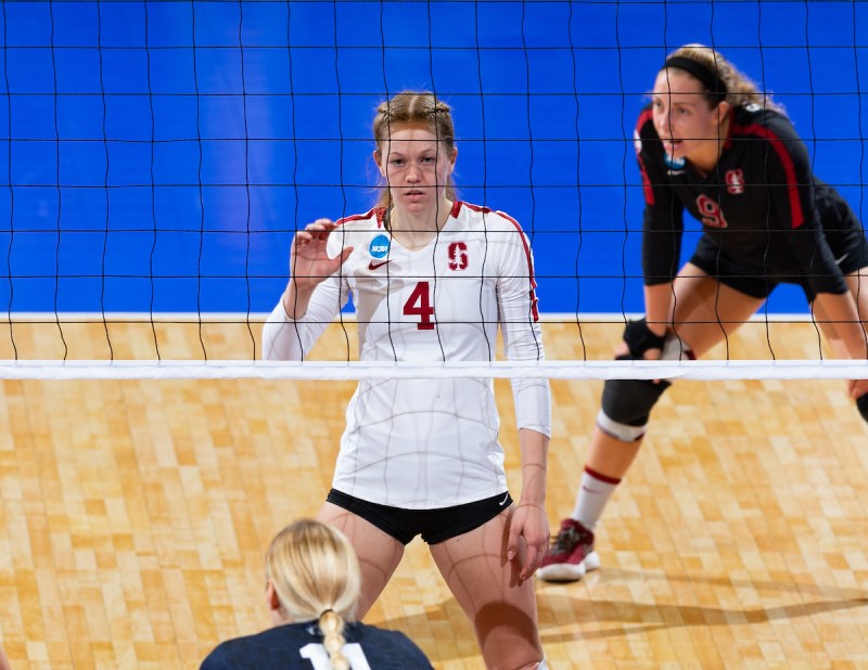 Meghan McClure (center) and Morgan Hentz (right) are two of the key pieces in Stanford's nearly impenetrable defense. Opponents have hit just .133 against the Cardinal this year. (JOHN P. LOZANO/isiphotos.com)