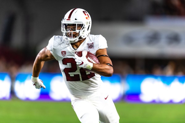 Cameron Scarlett was handed the ball 33 times and obliterated his career-high with 151 rushing yards on the way to an upset victory over No. 15 Washington at home. (ROB ERICSON/isiphotos.com)