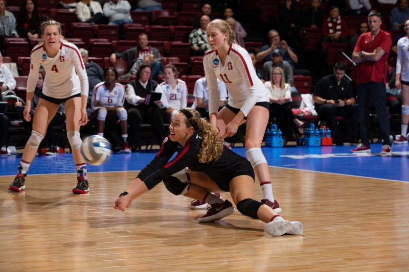 Despite the loss, senior libero Morgan Hentz made history Friday night, becoming just the third Cardinal player ever to record 2,000 digs in a career. (Photo: MIKE RASAY/isiphotos.com)