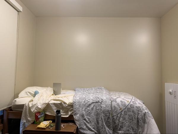 Henry Shen's blank dorm walls represent potential, not emptiness. (Photo: HENRY SHEN/The Stanford Daily)
