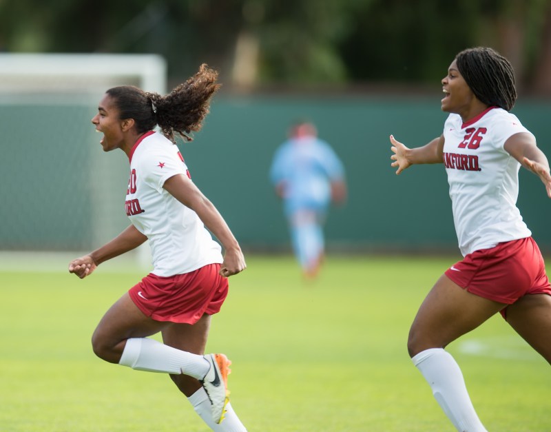 Juniors midfielder Catarina Macario (left) and forward Madison Haley (right) accounted for three of Stanford's four goals in a shutout victory of Hofstra Friday night. (Photo: David Bernal / isiphotos.com)
