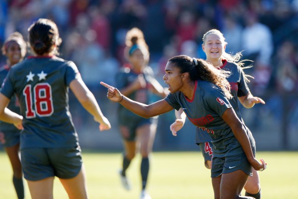 In front of an audience of 2,041 fans at Cagan Stadium, junior forward Catarina Macario (above right) added two goals to her program record of 32 on the season in Friday's 5-1 victory against BYU. The win advances the Cardinal to the NCAA semifinals against UCLA on Dec. 6. (Photo: BOB DREBIN/isiphotos.com)