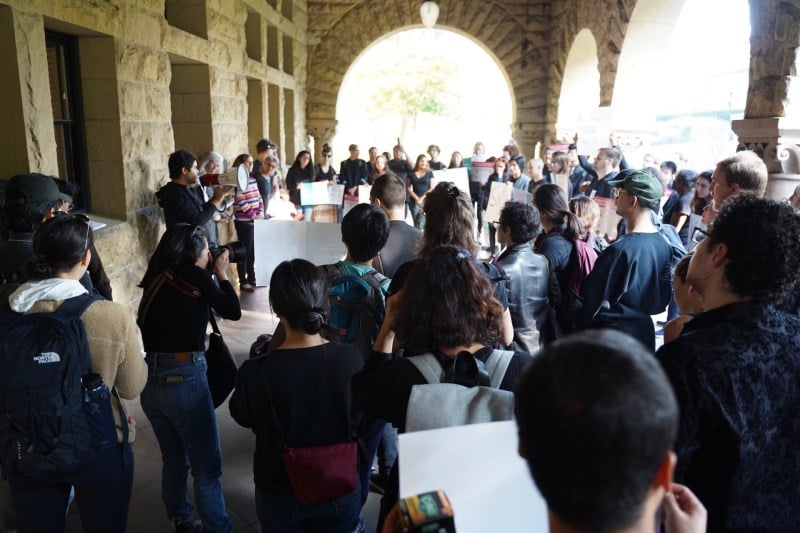 Protesters previously delivered a petition with more than 1,000 signatures calling for Stanford to make dependent care free for graduate students' children and spouses who are not covered by their employers. (Photo: CHRIS DEMBIA/The Stanford Daily)