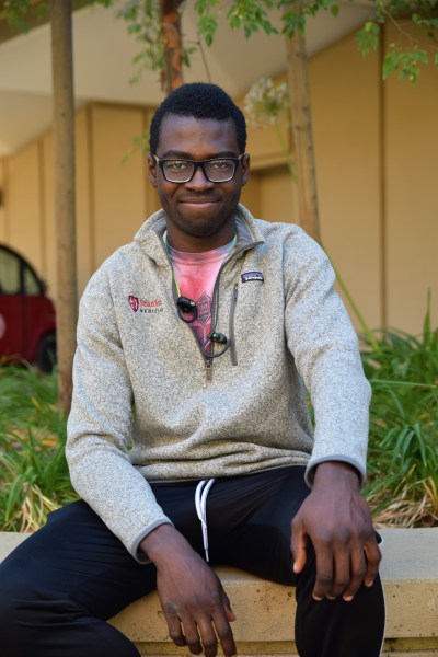 Habeeb Jimoh '22 works as a coordinator for a Spanish service learning course. (Photo: Evan Peng/The Stanford Daily)