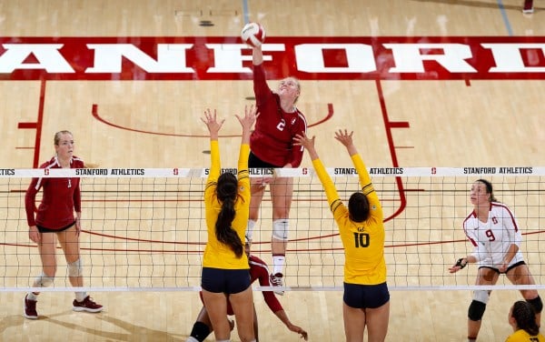 Jenna Gray (left), Kathryn Plummer (center) and Morgan Hentz (right) led the Cardinal in their respective areas over Arizona on Saturday. Gray came away with 38 assists, Plummer terminated 15 kills on .636 hitting, and Hentz dug 24 balls. (HECTOR GARCIA-MOLINA/isiphotos.com)
