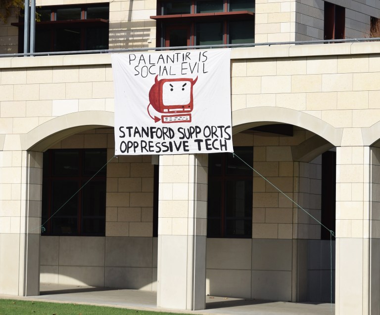 “We are trying to use our position as Stanford students to hold these companies accountable for the tech that they build for ICE and border control,” said a representative from SLAP about their Tuesday rally. (Photo: EVAN PENG/The Stanford Daily)