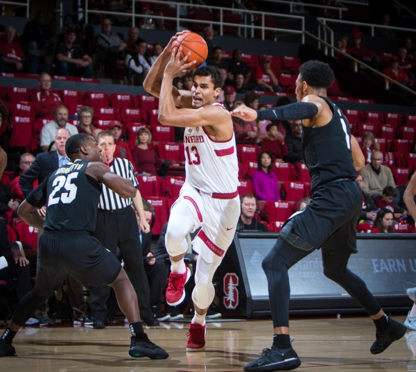 Junior forward Oscar da Silva (above) scored the first two points for Stanford and never relented. da Silva finished with a team-leading 21 points as the Cardinal trounced Montana 73-62.  (ERIN CHANG/isiphotos.com)